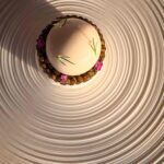 A starter of oysters and pearls with caviar, microherbs and merginue served as a starter at ROW on 45 in Dubai, a two-Michelin-starred restaurant.