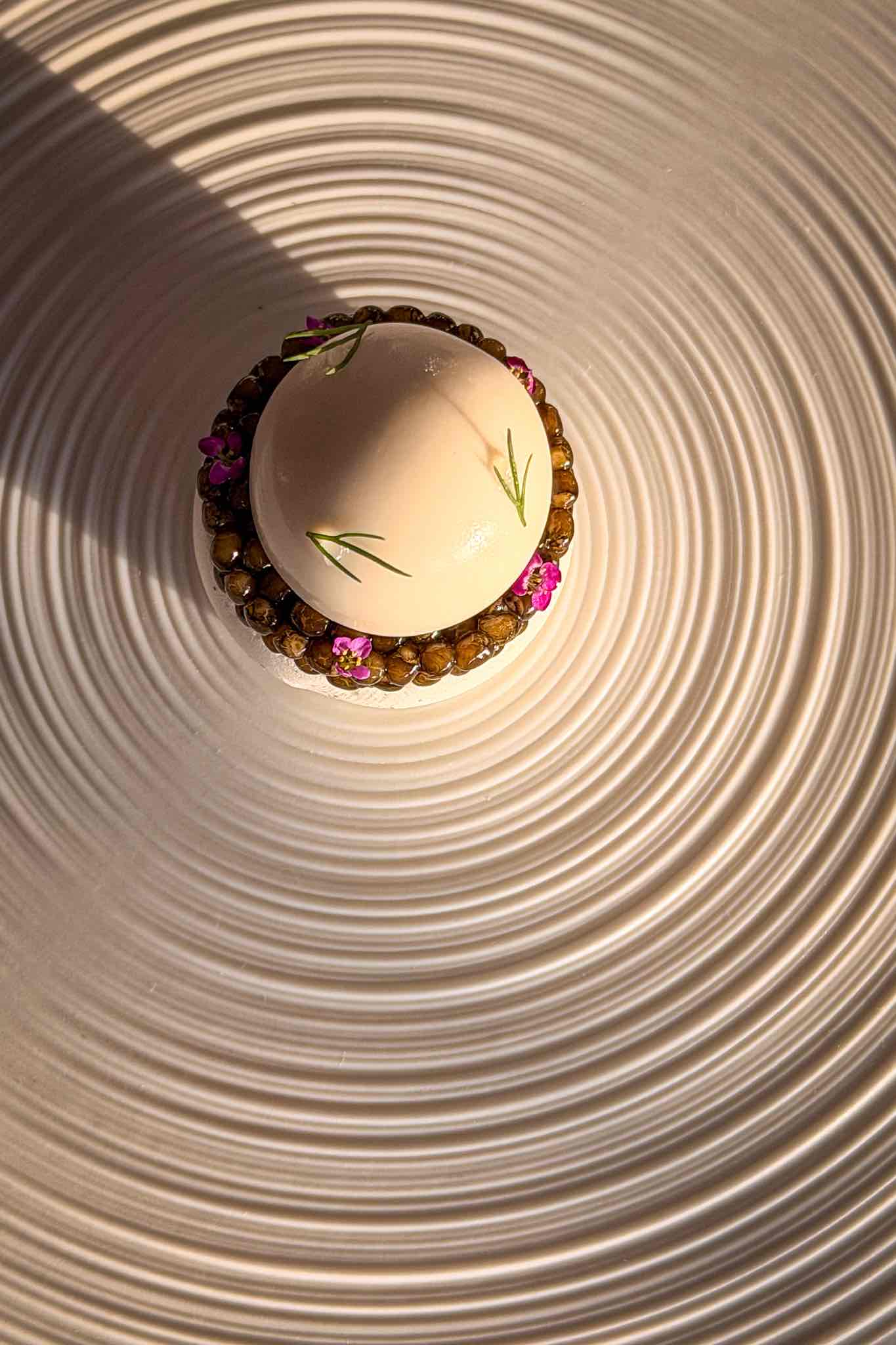 A starter of oysters and pearls with caviar, microherbs and merginue served as a starter at ROW on 45 in Dubai, a two-Michelin-starred restaurant.