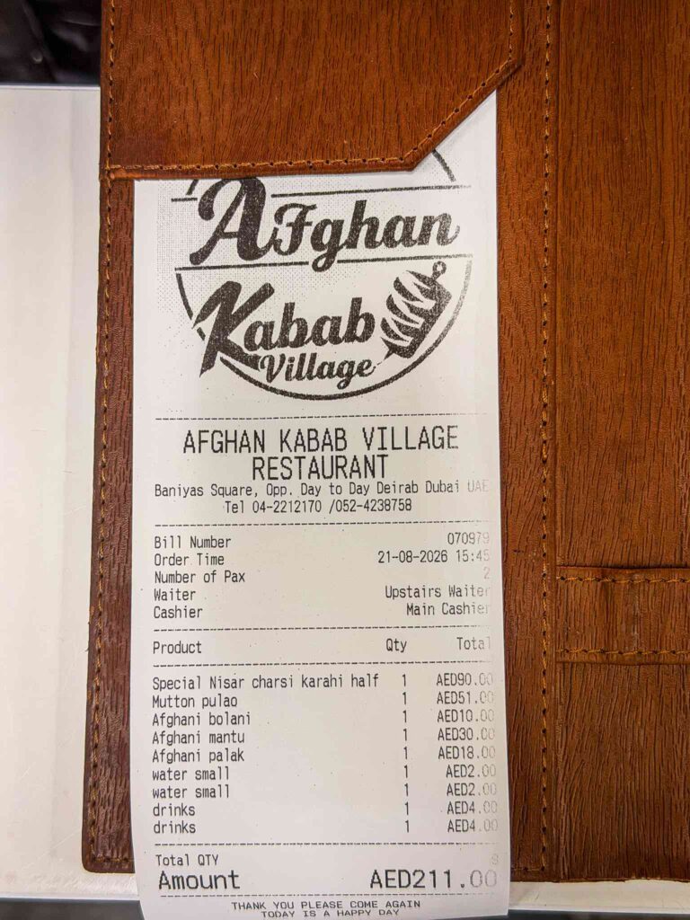 Itemised bill from Afghan Kabab Village Restaurant, Dubai, totalling 211 dirhams for two people
