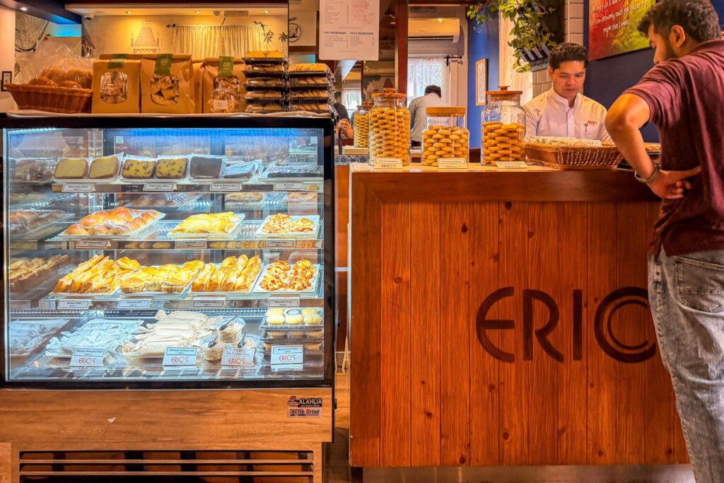 Bakery display and service counter inside Eric’s Restaurant in Karama, Dubai