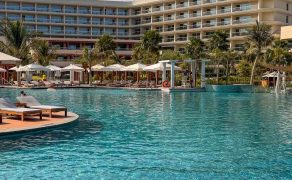 Main swimming pool and hotel building at InterContinental Ras Al Khaimah Mina Al Arab Resort