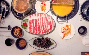 A full Taiwanese hotpot spread at TaoXiang Taiwan Hotpot in International City, Dubai, with bubbling seafood and spicy broths, thinly sliced beef, live shrimp, mushrooms, vegetables and custom dipping sauces. Taoxiang Taiwan Hotpot, China Cluster, International City, Dubai.